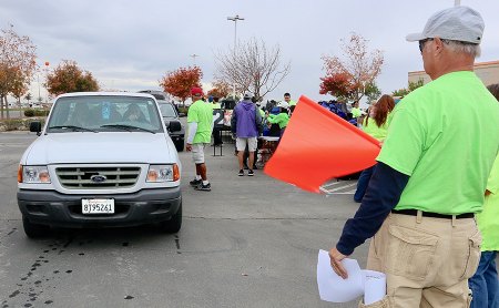 West Hills College Thanksgiving food distribution held Nov. 15 Plenty of volunteers were on hand to provide a steady flow.